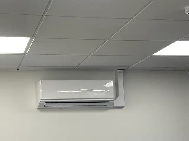 Commercial air conditioning in Bromley A wall-mounted air conditioning unit in an office, the kind of commercial air conditioning we fit for businesses in Bromley