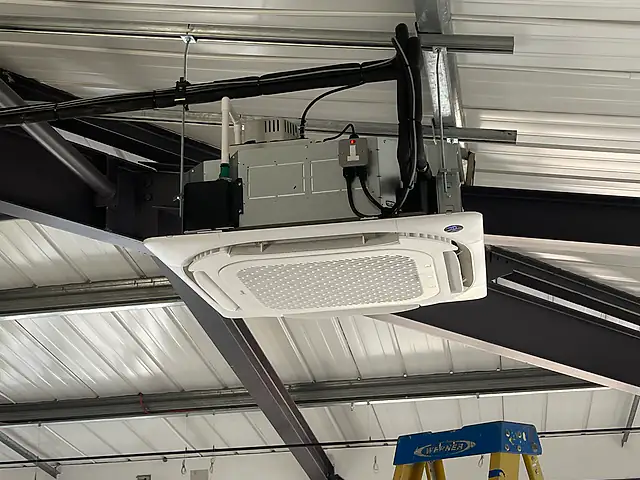 Commercial Air Conditioning in London Commercial Air Conditioning in London: a ceiling cassette air conditioner in a commercial unit